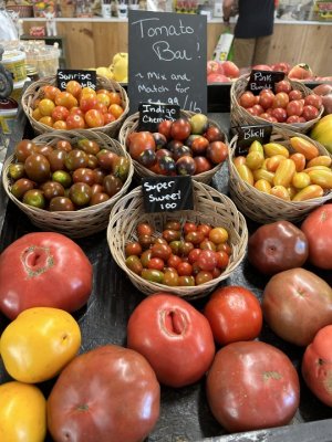The tomato Bar at Great Country Farms is filled with baskets of petite and cherry tomatoes as well as colorful varieties of Heirloom tomatoes